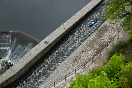 View of the Vltava River flowing through the town of Cesky Krumlov with the famous Cesky Krumlov...