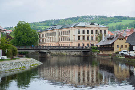 Panoramic landscape view on river Vltava in the historic city of Cesky Krumlov with famous Church cityのeditorial素材