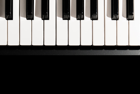 Musical piano keyboard close up