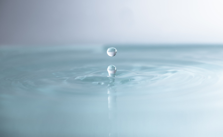 Water drops fallingの写真素材