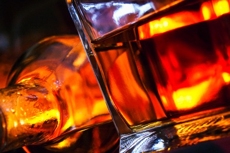 Alcoholic drink background with open fire .の写真素材