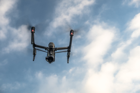 The new Inspire two flying in the blue sky
