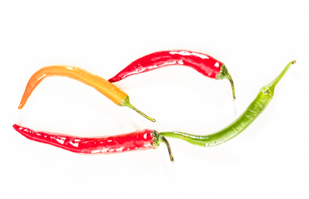 Hot chilli peppers isolated on whiteの写真素材