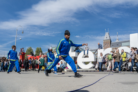 Amsterdam / Netherlands - April 31, 2017 - The Ajax Amsterdam breakdancing group performing in the city at the I amsterdam lettersのeditorial素材