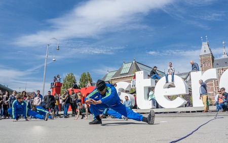 Amsterdam / Netherlands - April 31, 2017 - The Ajax Amsterdam breakdancing group performing in the city at the I amsterdam lettersのeditorial素材