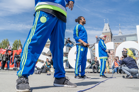 Amsterdam / Netherlands - April 31, 2017 - The Ajax Amsterdam breakdancing group performing in the city at the I amsterdam lettersのeditorial素材