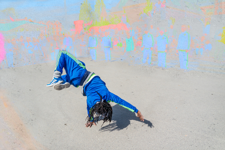 Breakdancer performing in the streetの写真素材