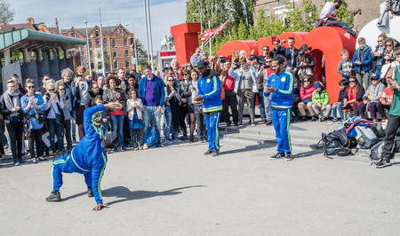 Amsterdam / Netherlands - April 31, 2017 - The Ajax Amsterdam breakdancing group performing in the city at the I amsterdam lettersのeditorial素材