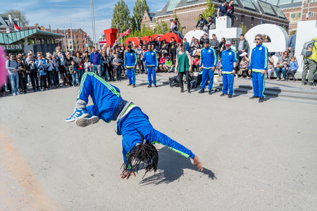 Amsterdam / Netherlands - April 31, 2017 - The Ajax Amsterdam breakdancing group performing in the city at the I amsterdam lettersのeditorial素材