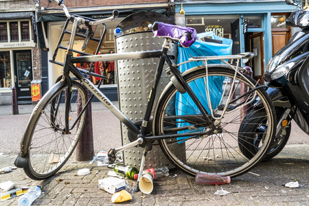 Amsterdam / Netherlands - April 31, 2017 : Garbage and dirt lying in the streets of Amsterdamのeditorial素材