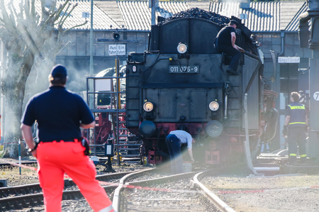 Bochum / Germany - April 18 2015 : Worker observing the activities at the railway main stationのeditorial素材