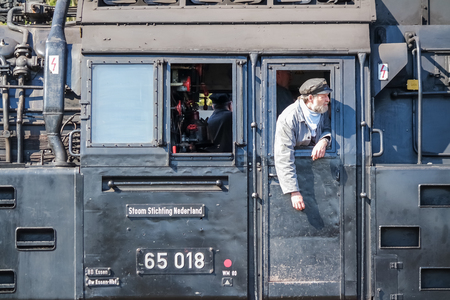 Bochum / Germany - April 18 2015 : Worker observing the activities at the railway main stationのeditorial素材