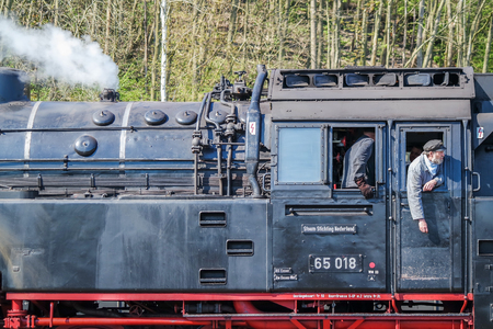 Bochum / Germany - April 18 2015 : Worker observing the activities at the railway main stationのeditorial素材