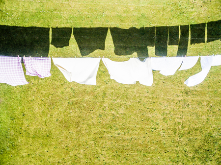Aerial of clothes hanging on a clotheslineの写真素材
