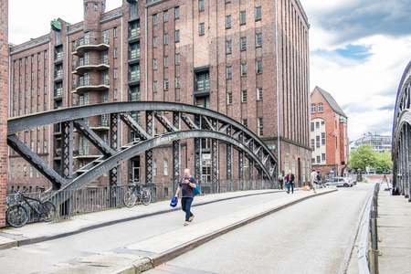 Hamburg / Germany - July 14, 2017: People visiting the Pogennmuehlen bridge in the warehouse district Hamburgのeditorial素材