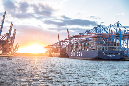 Hamburg / Germany - July 12 2017: Container gantry cranes of the terminal Eurogate and Burchardkai getting ready for unloading ships in the deepwater port Hamburg-Waltershofのeditorial素材