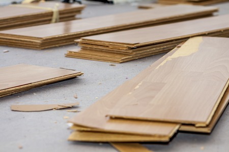 Room full of removed laminate lying on floorの写真素材