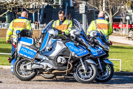 Stuttgart / Germany - February 19 2018 : German police with moto bikes protecting the Fasching activities in the cityのeditorial素材