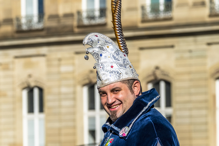 Stuttgart / Germany - February 19 2018 : Smiling man on Shrove Tuesday during the carnival seasonのeditorial素材