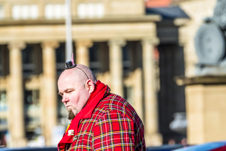 Stuttgart / Germany - February 19 2018 : Man making a serious face during the Shrove Tuesday paradeのeditorial素材