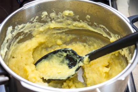 Mashed potatoes in a big potの写真素材
