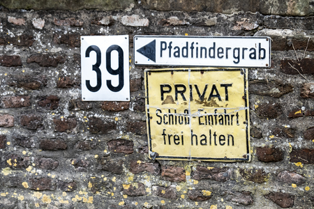 Liedberg / Germany - April 14 2018: Sign showing the way to the pathfinder graveのeditorial素材
