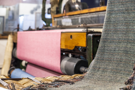 Historic woolen mill production background with Tweed.の写真素材