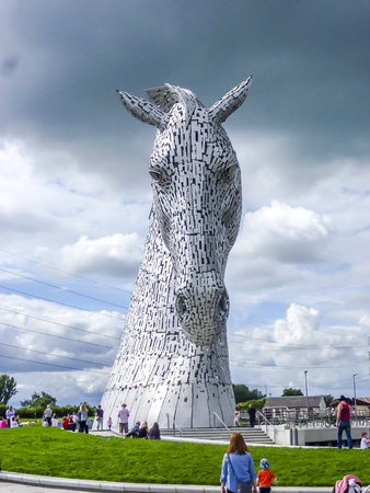 Falkirk / Scotland - June 22 2018 - Thunder clouds moving above The Kelpies statue by Andy Scot, Helix parkのeditorial素材