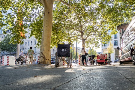 Frankfurt / Germany - August 02 2018: Wheelchair standing at Opernplatz during one of the warmest summer days in the cityのeditorial素材