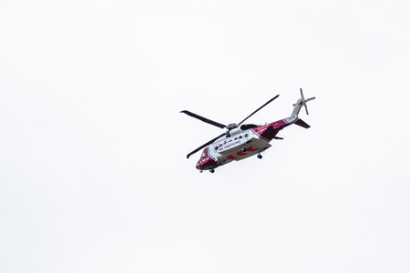 Ogwen Glen / Wales - April 29 2018 : British HM Coastguard helicopter Sikorsky S-92 operated by...