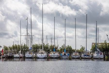 Ringkobing / Denmark - August 15 2018 : SHips waiting for the sailorのeditorial素材