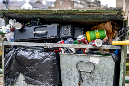 Caernarfon / Wales - May 01 2018 : Dustbins overflowing close to the castleのeditorial素材