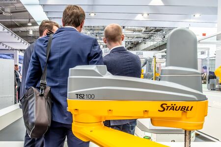 Hannover / Germany - April 02 2019 : Staubli is presenting the newest generation of cobots -...
