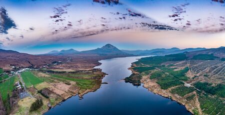 Sunset above mount errigal and Lough Nacung Lower , County Donegal - Irelandの写真素材