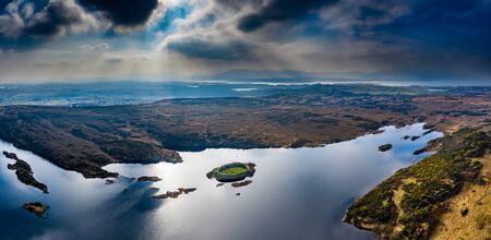 Aerial view of Lough Doon between Portnoo and Ardara which is famous for the medieval fort - County Donegal - Irelandの写真素材