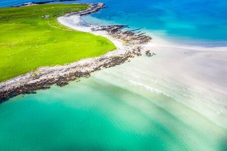 Aerial view of the awarded Narin Beach by Portnoo and Inishkeel Island in County Donegal, Ireland
