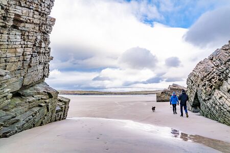 The beach and caves at Maghera Beach near Ardara, County Donegal - Ireland.の写真素材