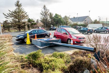 Dungloe, County Donegal / Ireland - February 17 2020 : Broken Aldi sign due to the storm