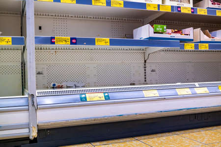DUNGLOE / IRELAND - MARCH 17 2020 : The chicken shelves are empty during the coronavirus outbreak.