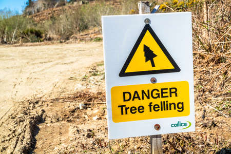 Clooney / Ireland - April 13 2020 : Sign warning of the danger of tree fellingのeditorial素材