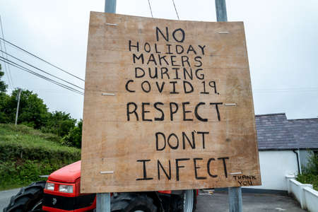 PORTNOO, COUNTY DONEGAL / IRELAND - APRIL 10 2020 : Sign warning no holiday makers during covid 19....