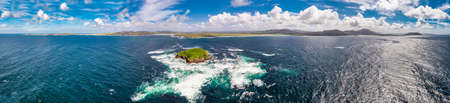 Aerial of Glashedy Island , an uninhabitated island west of Trawbreaga Bay - Donegal, Irelandの写真素材
