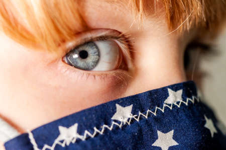 Close up of girl wearing a mask during the pandemic