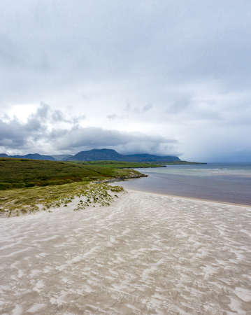 Beautiful beach in Sheskinmore bay between Ardara and Portnoo in Donegal - Irelandの写真素材