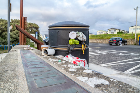 PORTNOO, COUNTY DONEGAL , IRELAND - AUGUST 18 2020: Dustbin is overly full during the pandemicのeditorial素材