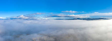 Above the clouds at Portnoo in County Donegal with fog - Irelandの写真素材