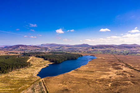 Aerial view of peatbog and Lake Ananima next to the town Glenties in County Donegal - Ireland.の写真素材