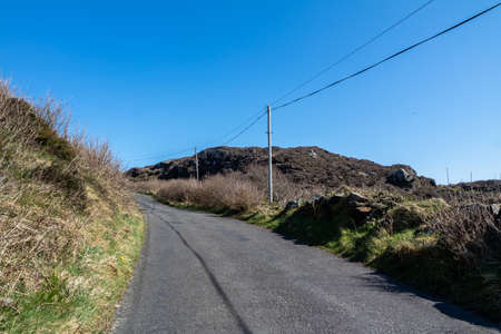 Utility Pole and lines for transmission of electricity and communication to dwellings in rural...