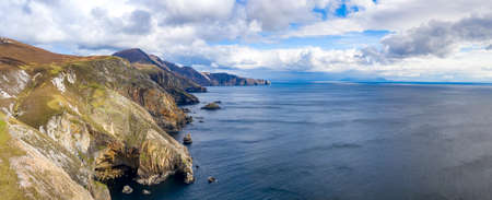 Aerial view of the beautiful coast at Malin Beg with Slieve League in the background in County...