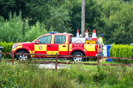 Donegal , Ireland - July 26 2021 : Rescue forces help at car accident in Portnoo during the Pandemic